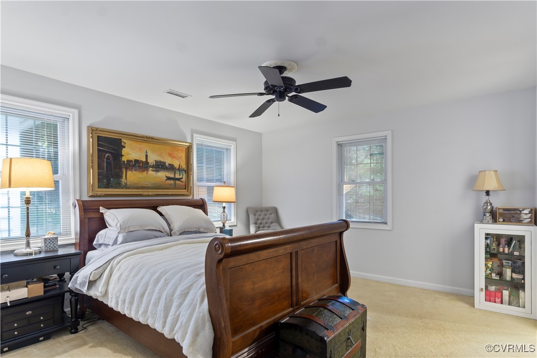 4824 Bristol Circle Williamsburg, VA 23185 - Photo 18 of 36 Bedroom with light carpet and ceiling fan