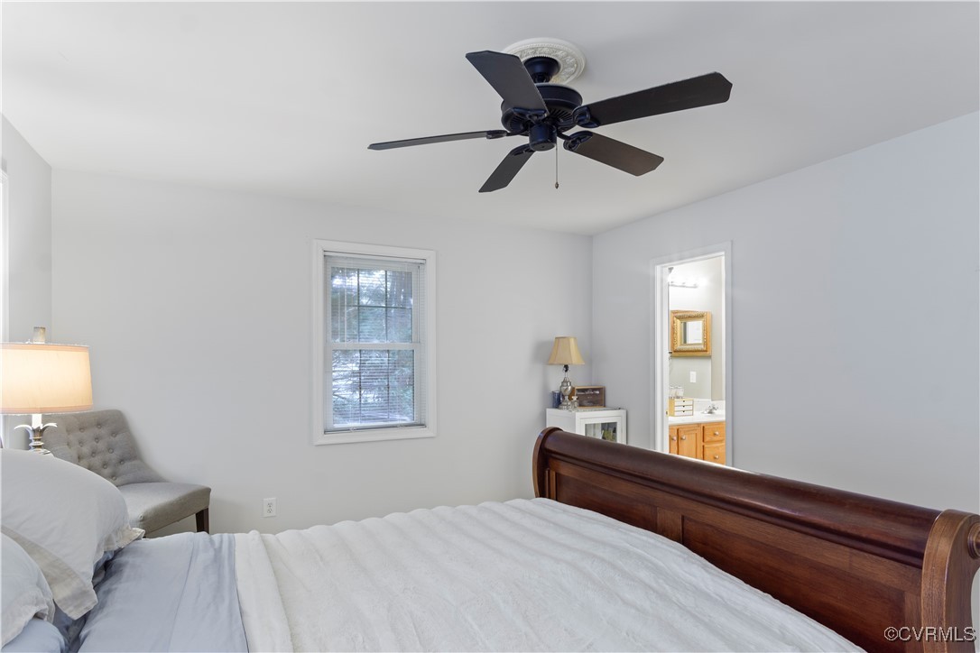 4824 Bristol Circle Williamsburg, VA 23185 - Photo 19 of 36 Bedroom featuring ceiling fan and ensuite bath