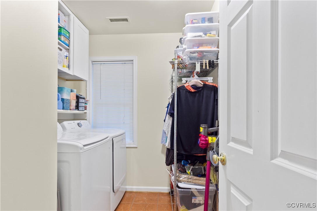 4824 Bristol Circle Williamsburg, VA 23185 - Photo 26 of 36 Clothes washing area with light tile patterned flo