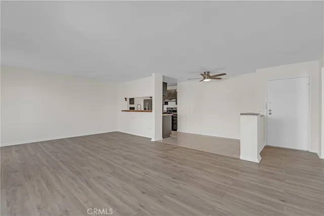 a view of kitchen with wooden floor