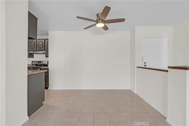 a view of a porch with wooden floor and a yard