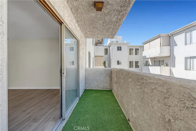 a view of building with large windows