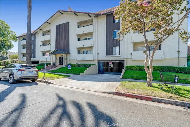 a view of house with outdoor space and swimming pool