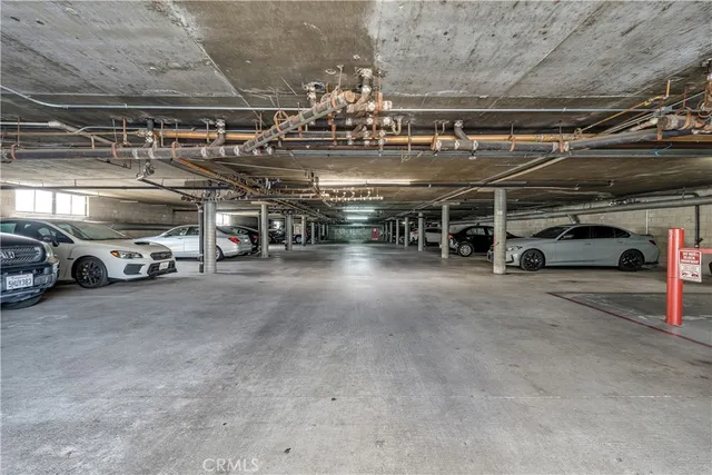 an aerial view of multiple houses with yard
