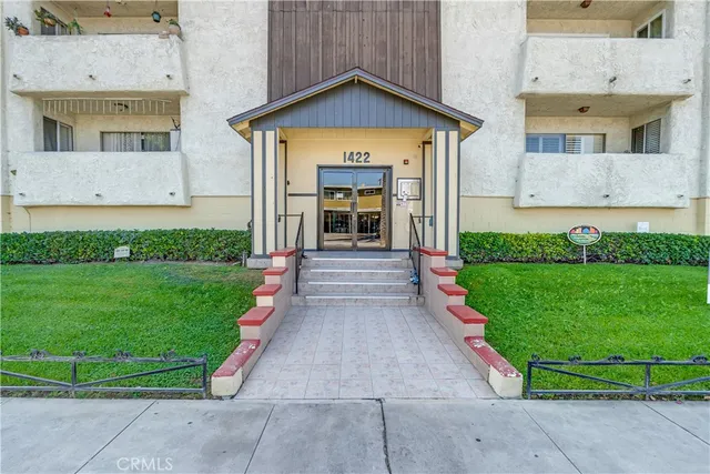 a kitchen with stainless steel appliances granite countertop a stove and a refrigerator
