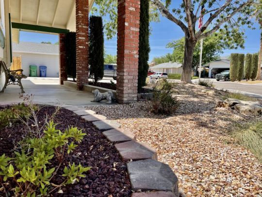 608 Heather Court Ridgecrest, CA 93555 - Photo 3 of 28 a view of a pathway with a garden