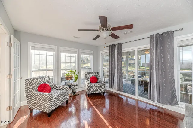 a kitchen with granite countertop wooden cabinets stainless steel appliances and a sink