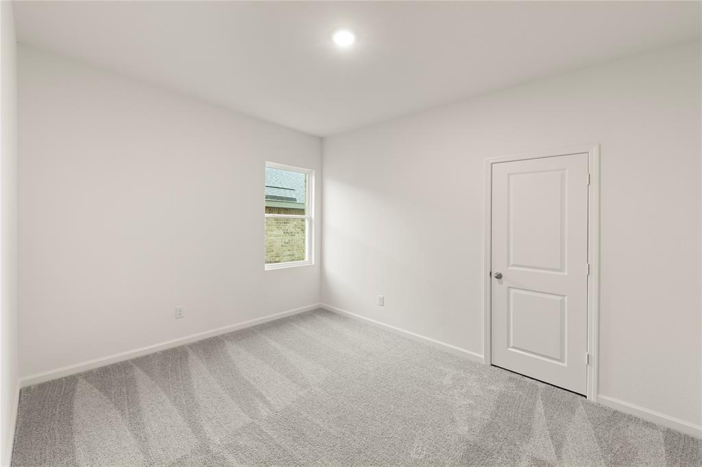 1324 Kennedy Road Howe, TX 75459 - Photo 23 of 29 an empty room with windows