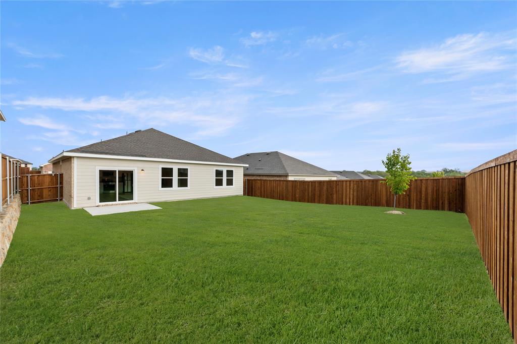 1324 Kennedy Road Howe, TX 75459 - Photo 29 of 29 a big house with a big yard and large trees