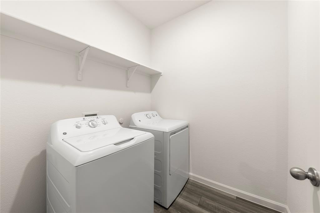 1324 Kennedy Road Howe, TX 75459 - Photo 9 of 29 a utility room with dryer and washer