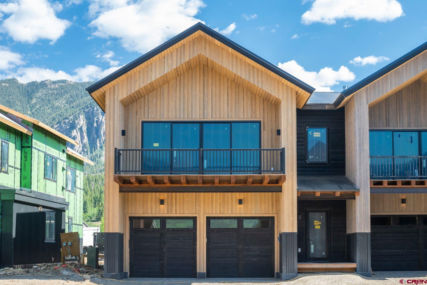 180 Elk Valley Road, Unit 108 Crested Butte, CO 81224 - Photo 1 of 28 a front view of a building
