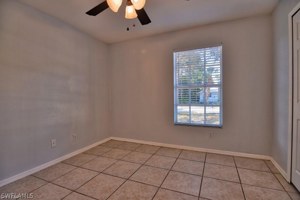 8128 Anhinga Road Fort Myers, FL 33967 - Photo 12 of 12 a view of an empty room with a window