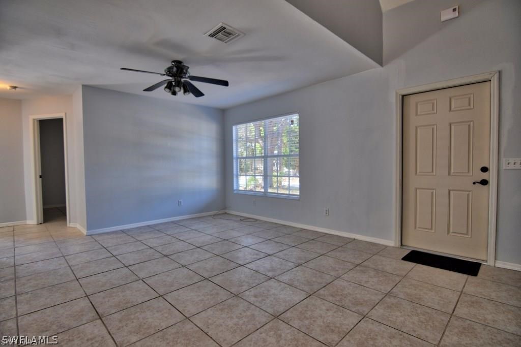 8128 Anhinga Road Fort Myers, FL 33967 - Photo 3 of 12 a view of an empty room and window