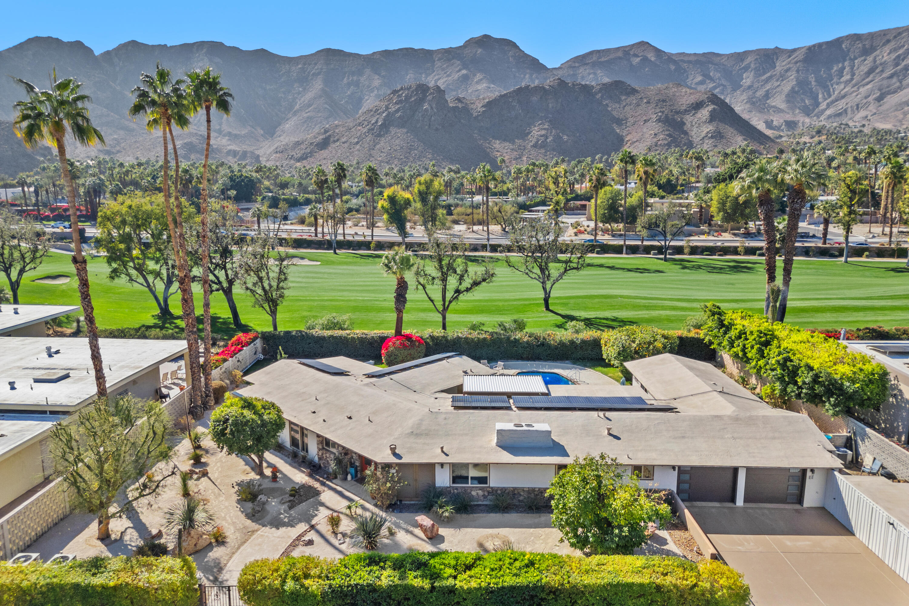 70801 Fairway Drive Rancho Mirage, CA 92270 - Photo 1 of 48 an aerial view of a house with big yard