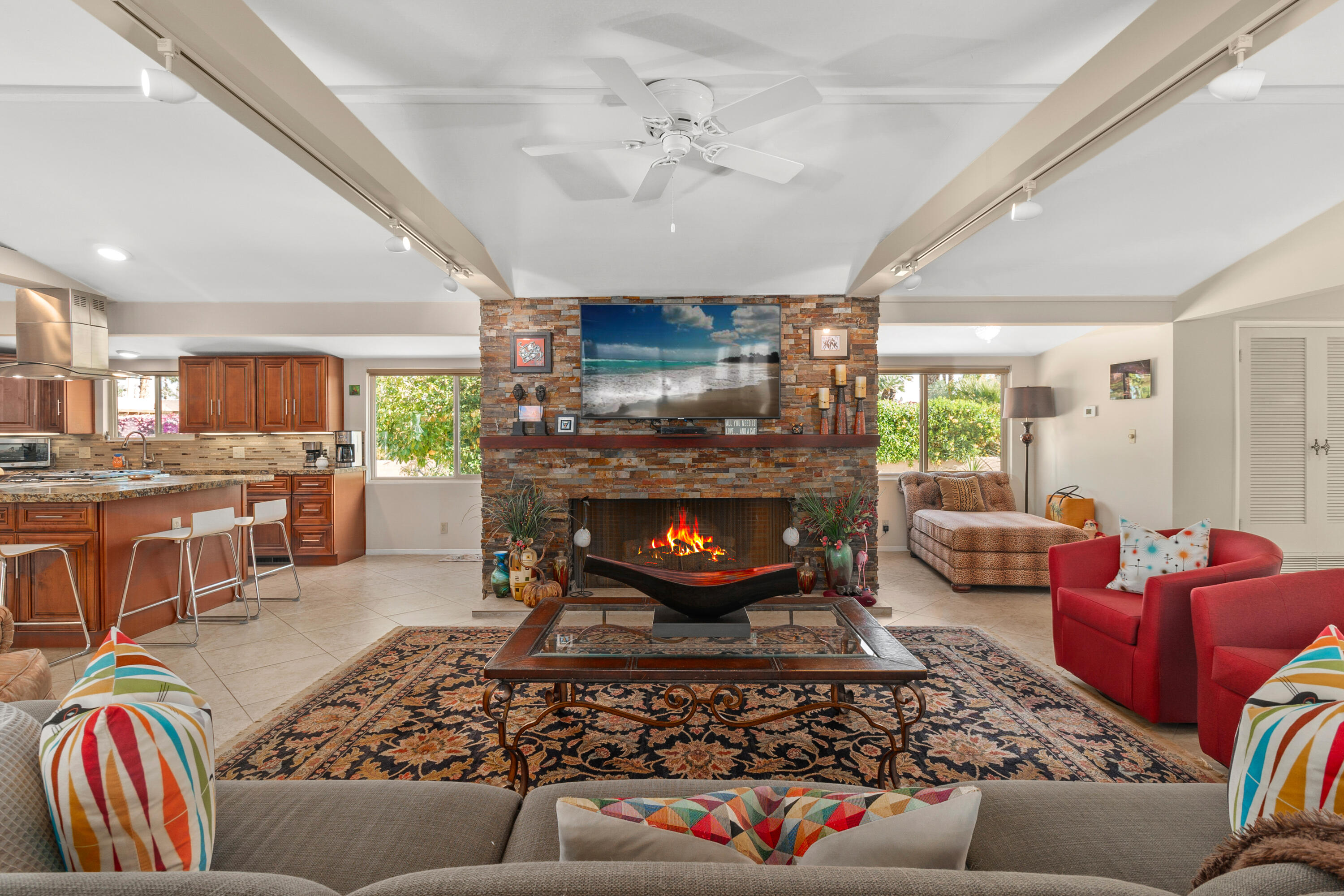 70801 Fairway Drive Rancho Mirage, CA 92270 - Photo 13 of 48 a living room with furniture and a fireplace