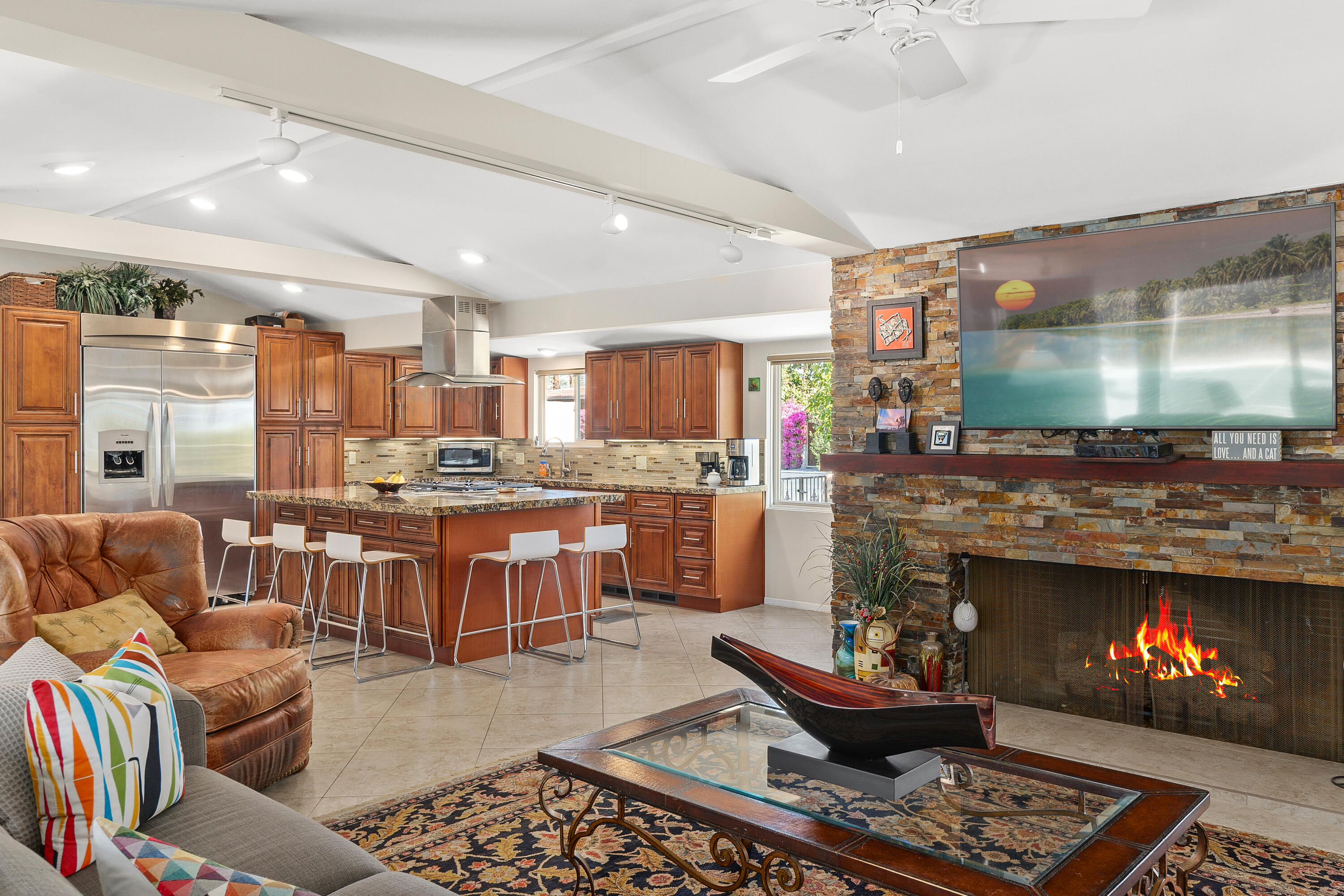 70801 Fairway Drive Rancho Mirage, CA 92270 - Photo 14 of 48 a living room with furniture and a fireplace