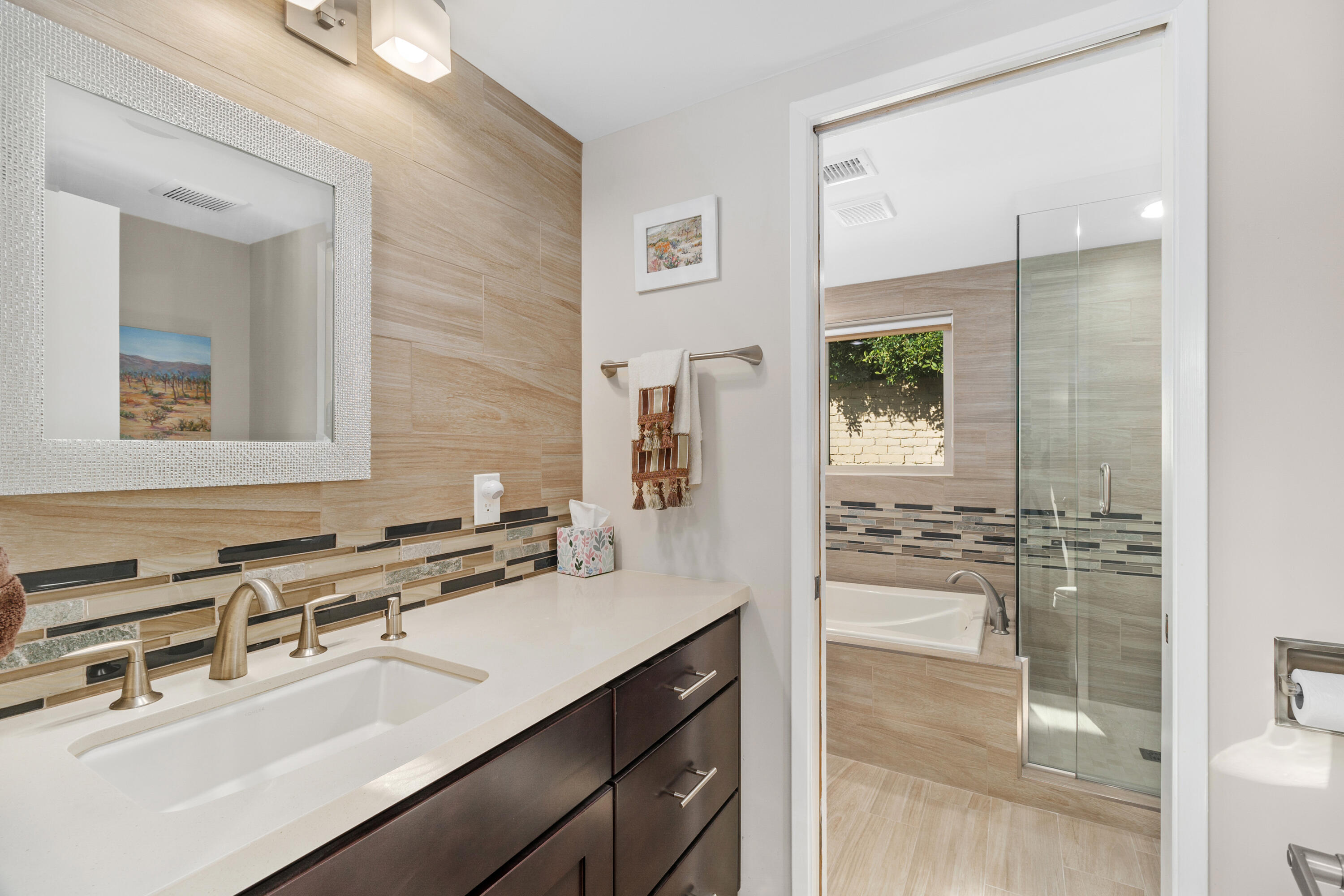 70801 Fairway Drive Rancho Mirage, CA 92270 - Photo 34 of 48 a bathroom with a sink and a mirror
