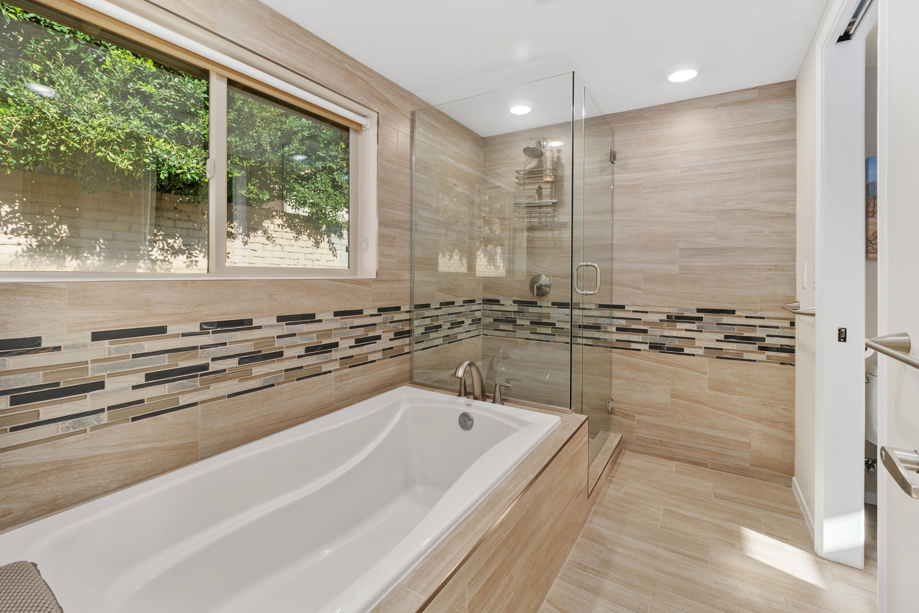 70801 Fairway Drive Rancho Mirage, CA 92270 - Photo 35 of 48 a bathroom with a bathtub and a sink