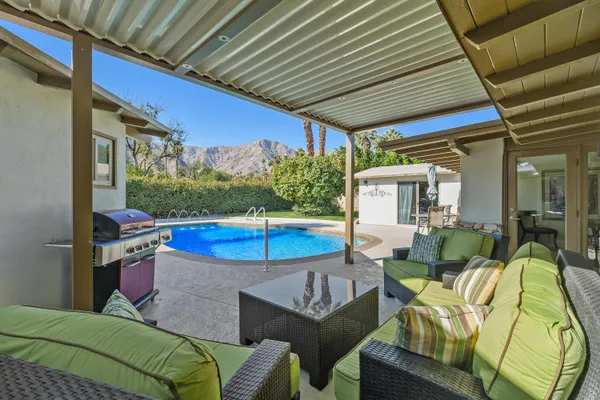 a view of a house with swimming pool