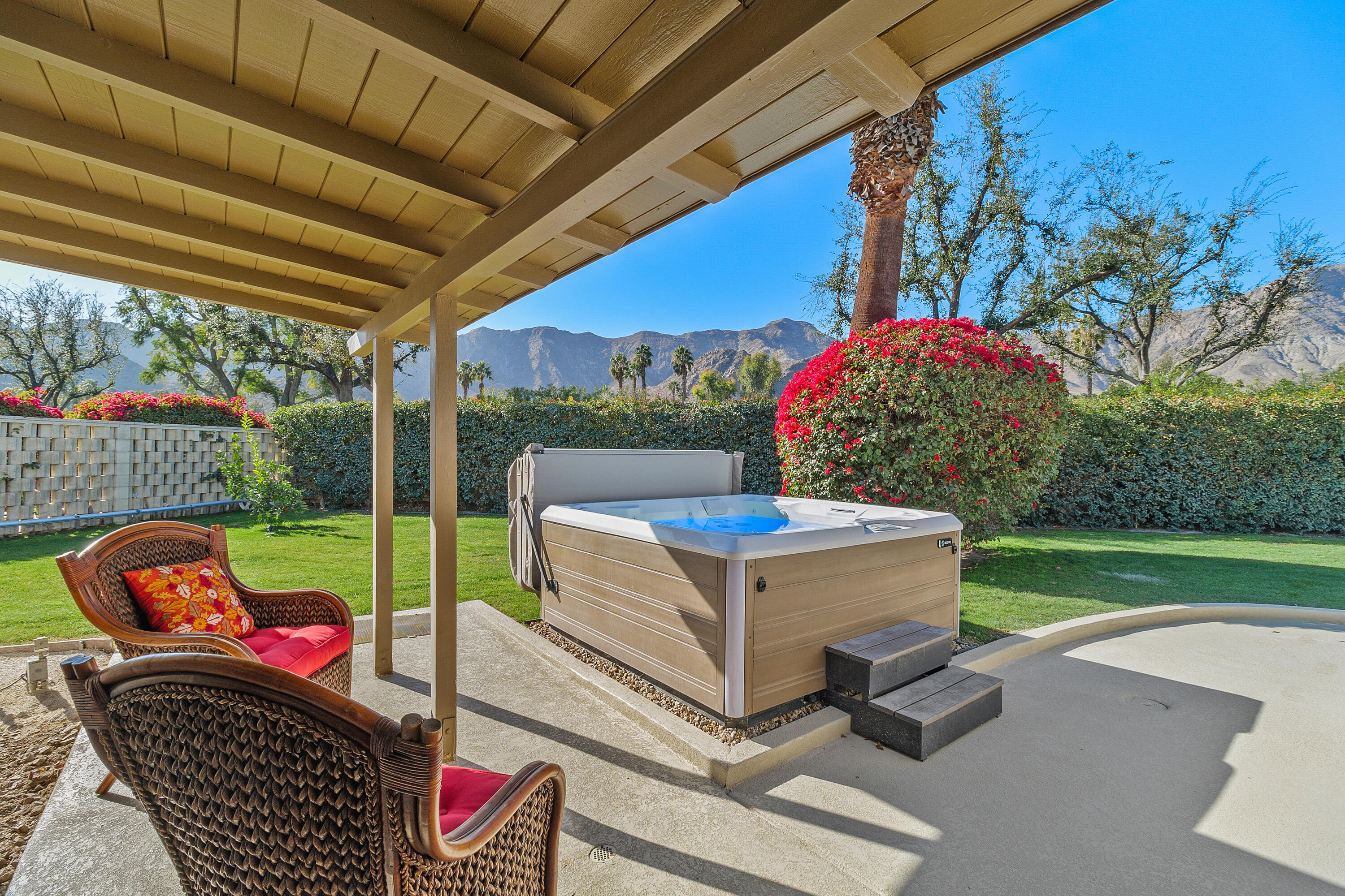 70801 Fairway Drive Rancho Mirage, CA 92270 - Photo 42 of 48 a view of backyard with swimming pool and outdoor seating