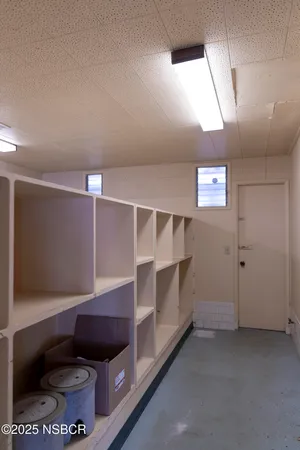 a view of hallway with closet