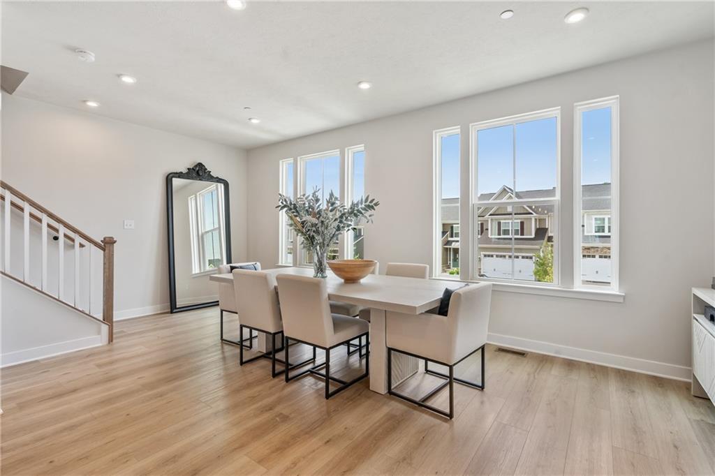4608 Spruce Road Gibsonia, PA 15044 - Photo 14 of 32 a view of a dining room with furniture window and wooden floor