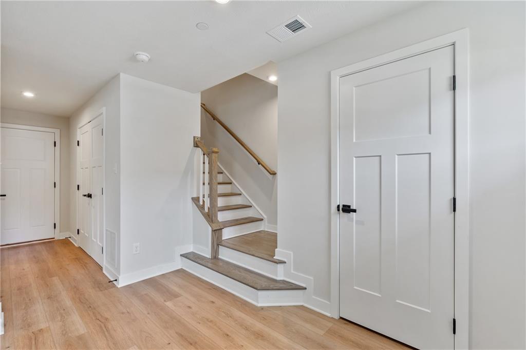 4608 Spruce Road Gibsonia, PA 15044 - Photo 17 of 32 a view of a hallway with wooden floor and entryway