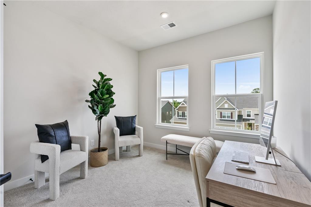 4608 Spruce Road Gibsonia, PA 15044 - Photo 21 of 32 a living room with furniture and a potted plant