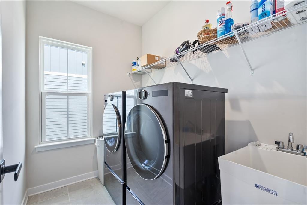 4608 Spruce Road Gibsonia, PA 15044 - Photo 25 of 32 a utility room with dryer and washer