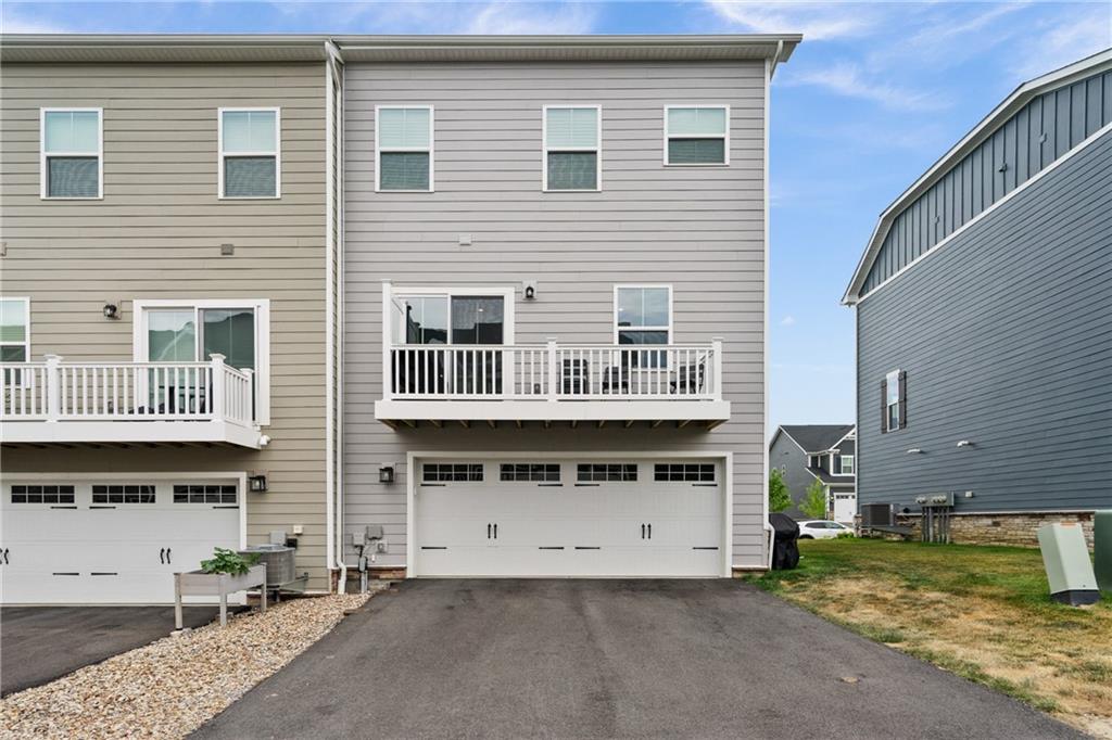 4608 Spruce Road Gibsonia, PA 15044 - Photo 26 of 32 a view of a house with a yard and balcony