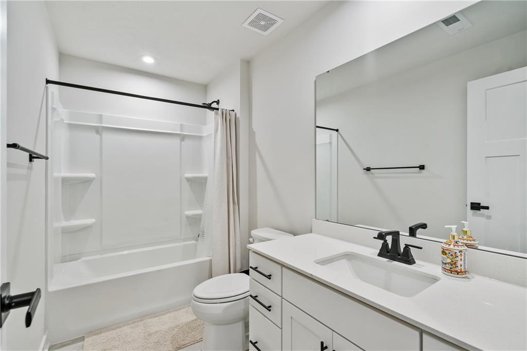 4608 Spruce Road Gibsonia, PA 15044 - Photo 4 of 32 a bathroom with a sink toilet and shower