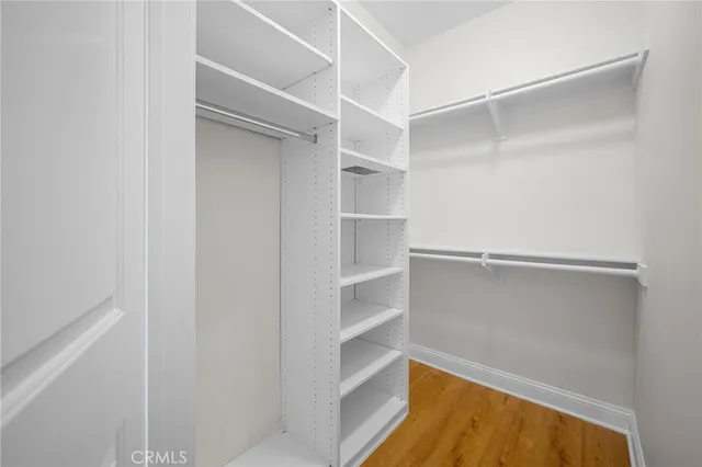 a view of an empty walk in closet