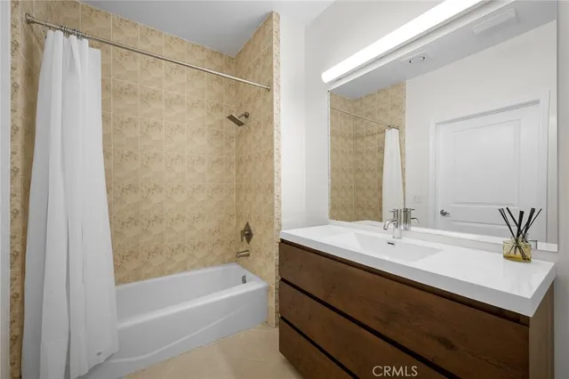 a bathroom with a sink and a bathtub