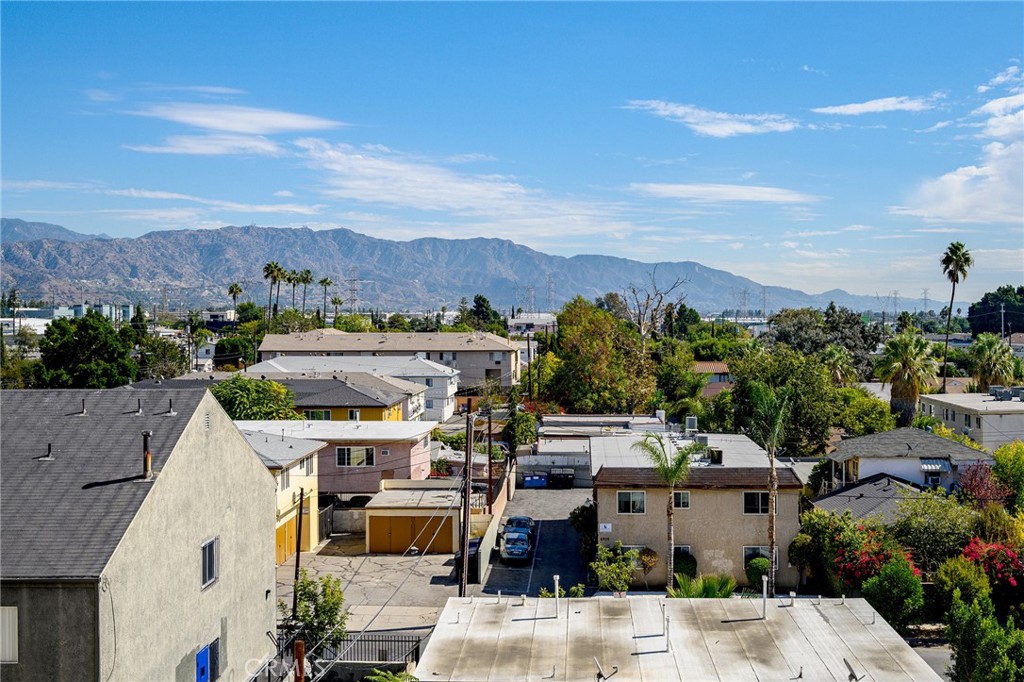 6938 Laurel Canyon Boulevard, Unit 101 North Hollywood, CA 91605 - Photo 29 of 32 a view of a city from a terrace