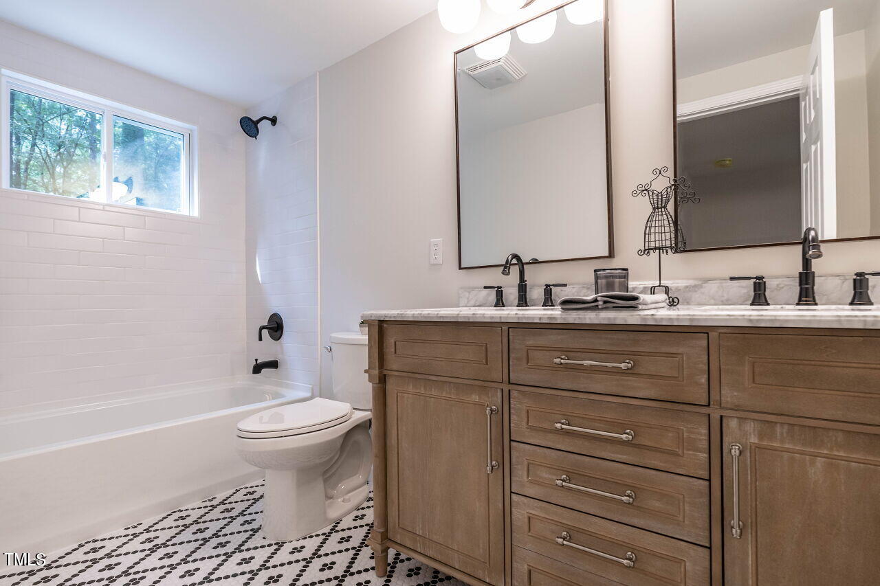 1940 Hilltop Road Raleigh, NC 27610 - Photo 15 of 25 027-1280x960-bathroom