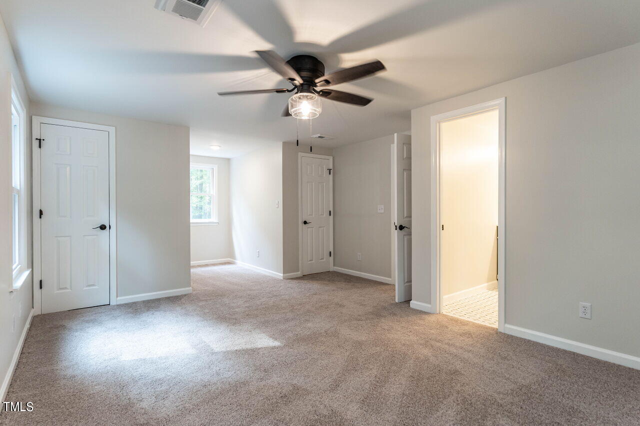 1940 Hilltop Road Raleigh, NC 27610 - Photo 17 of 25 029-1280x960-primary-bedroom