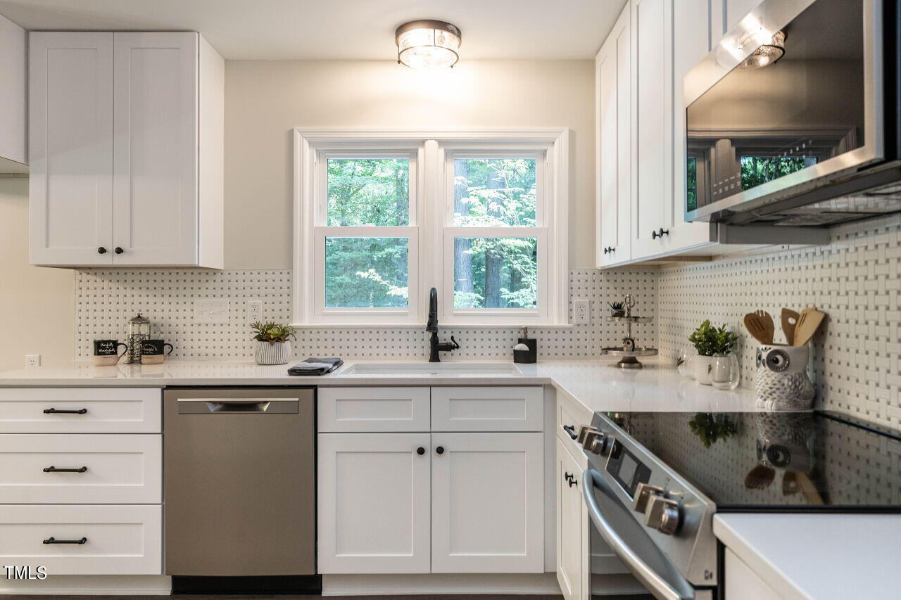 1940 Hilltop Road Raleigh, NC 27610 - Photo 6 of 25 017-1280x960-kitchen