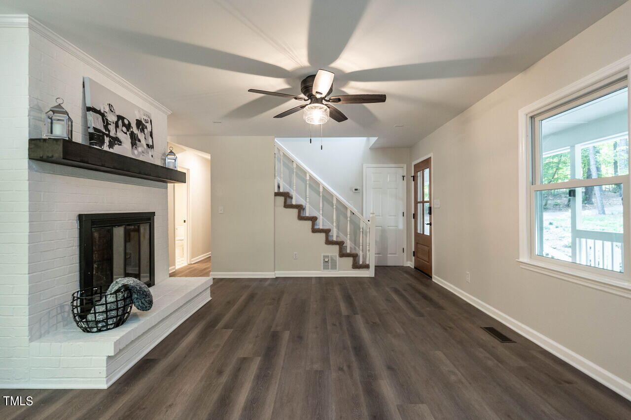 1940 Hilltop Road Raleigh, NC 27610 - Photo 7 of 25 010-1280x960-living-room