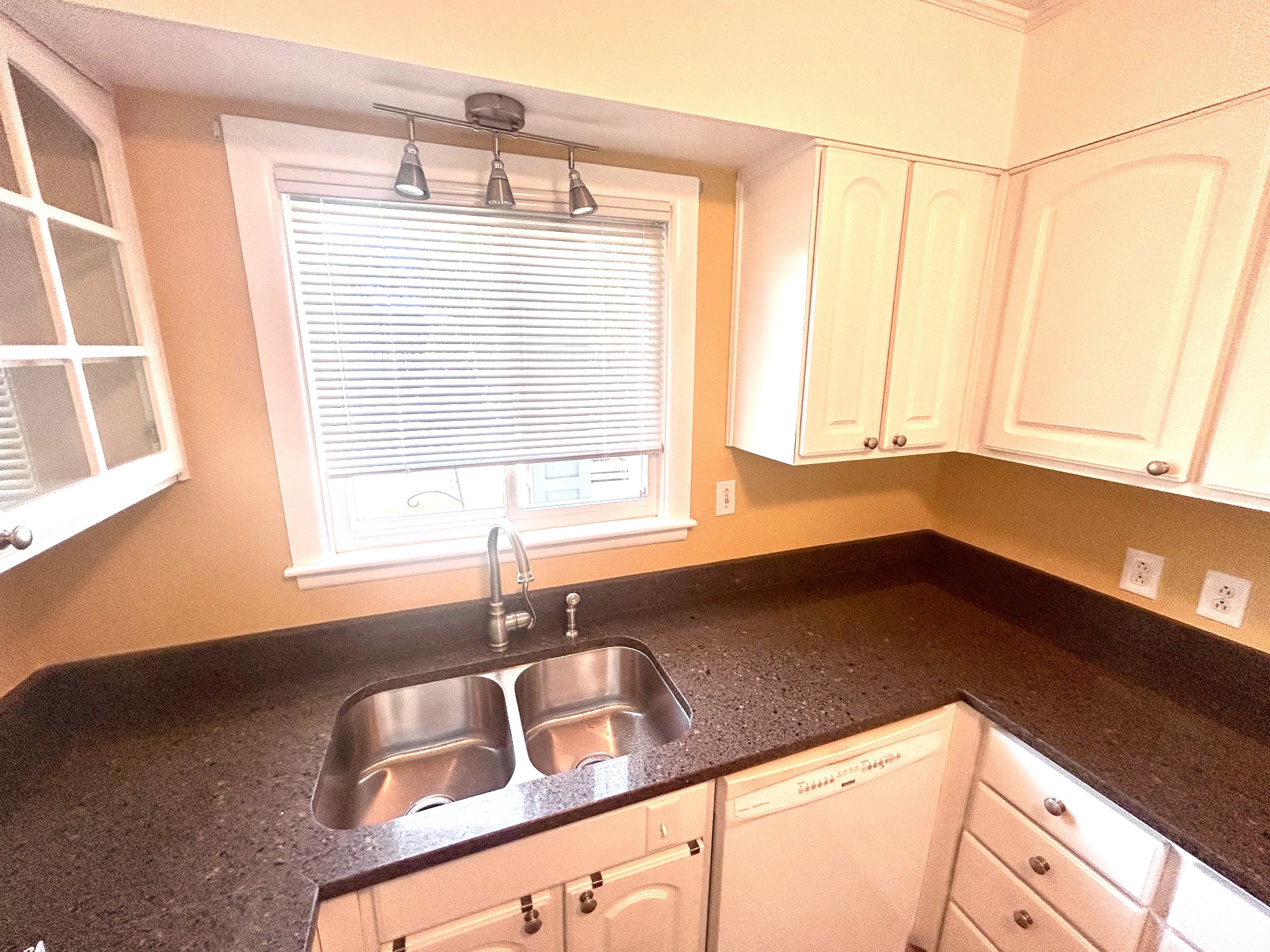1900 Richard Jones Road, Unit D2 Nashville, TN 37215 - Photo 4 of 7 a kitchen with a sink cabinets and a large window