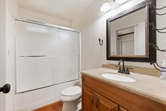 a view of an empty room with balcony