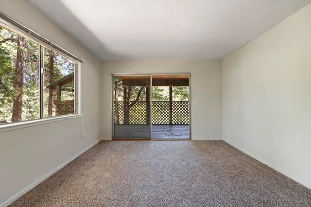 a bathroom with a sink toilet and mirror