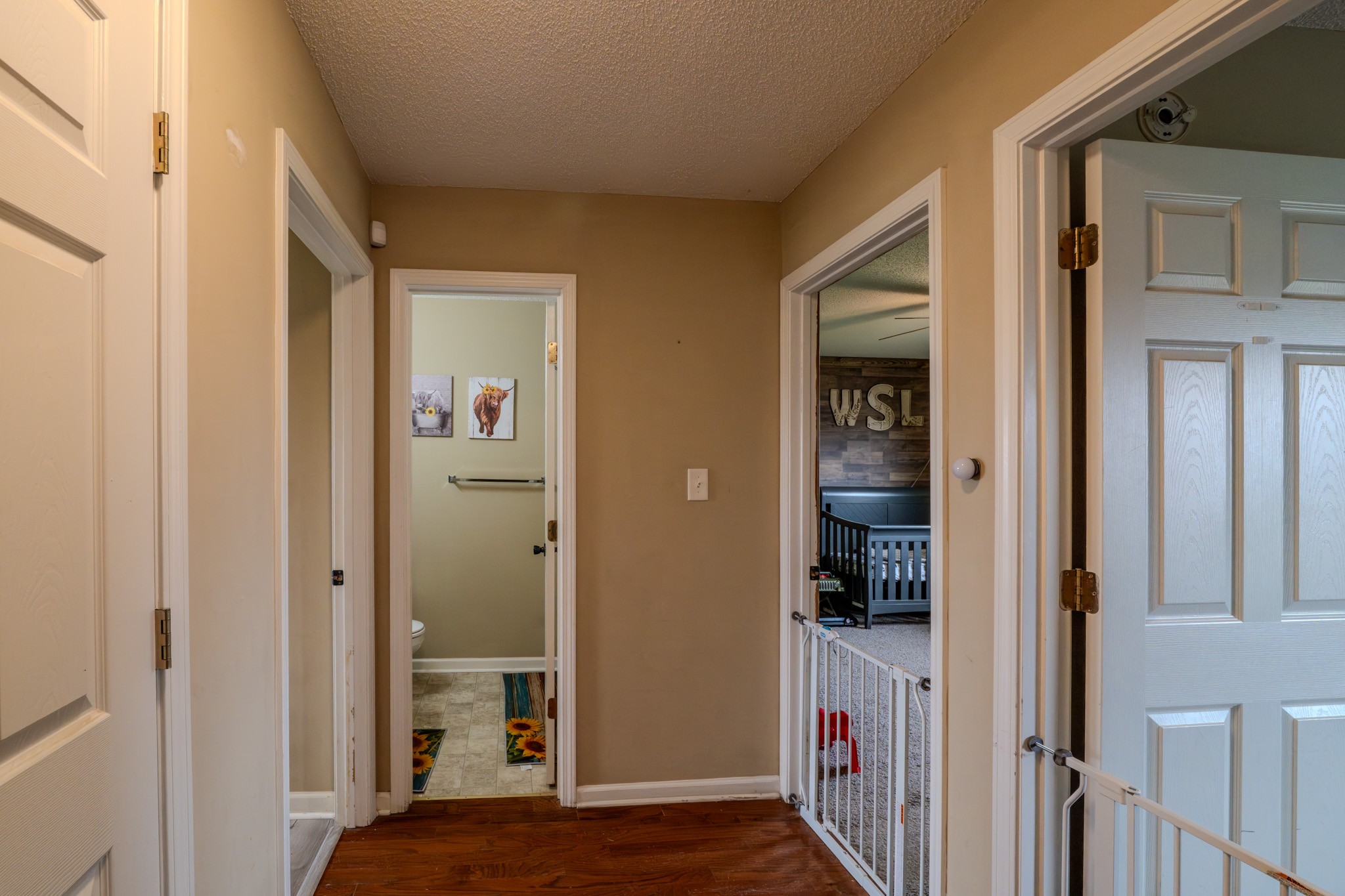 1735 Hazelwood Road Clarksville, TN 37042 - Photo 13 of 23 wooden floor in a gallery