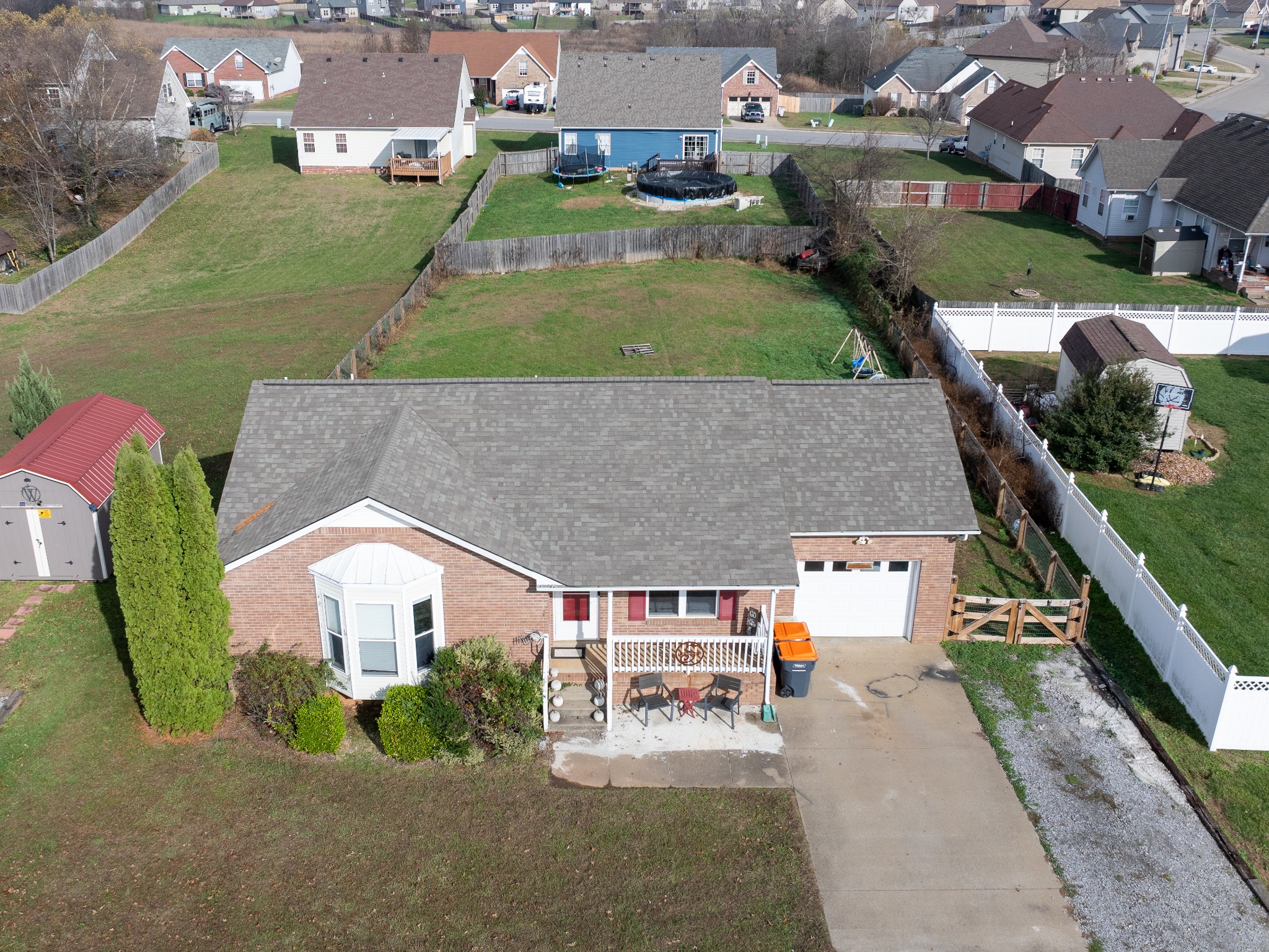 1735 Hazelwood Road Clarksville, TN 37042 - Photo 19 of 23 an aerial view of a house with a garden and plants