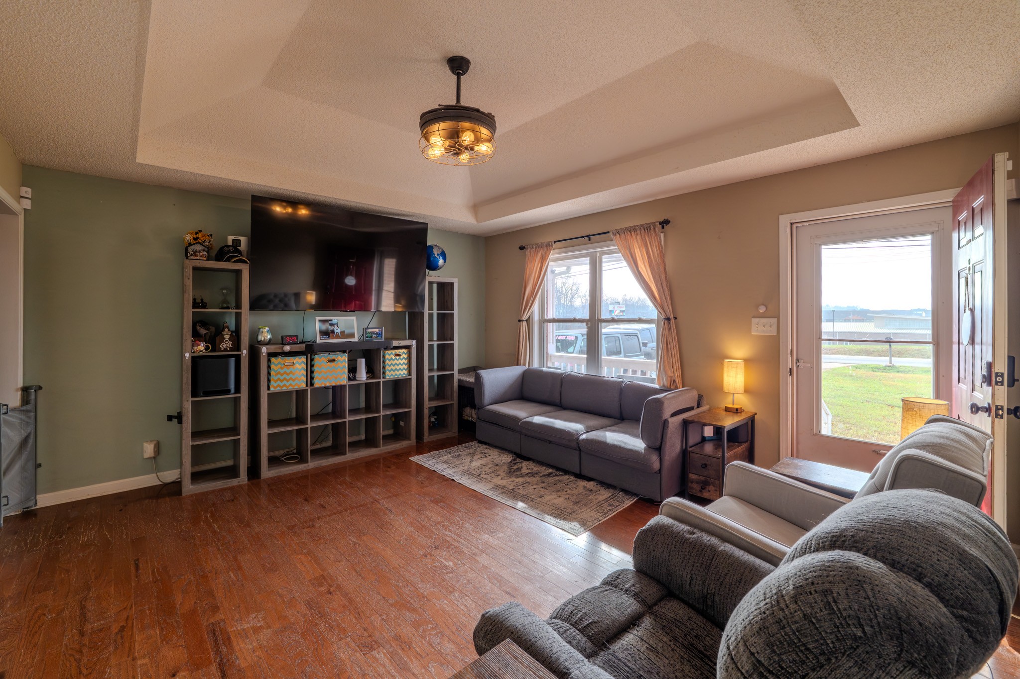 1735 Hazelwood Road Clarksville, TN 37042 - Photo 5 of 23 a living room with furniture and a flat screen tv