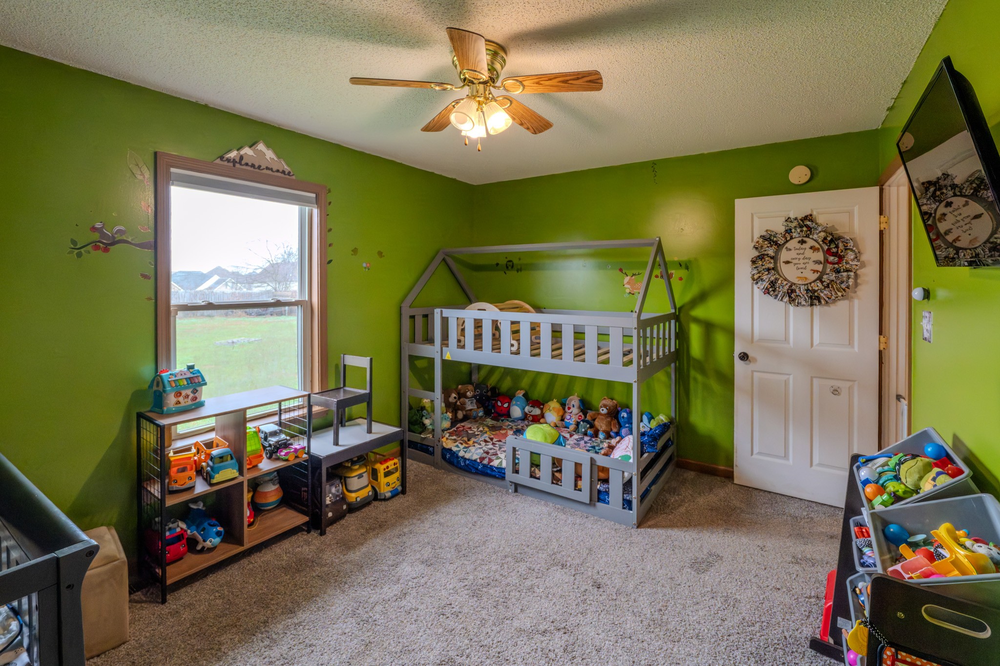 1735 Hazelwood Road Clarksville, TN 37042 - Photo 10 of 23 a children room with toys and a baby crib