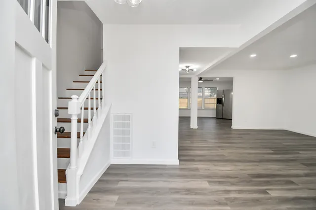 a view of entryway with wooden floor