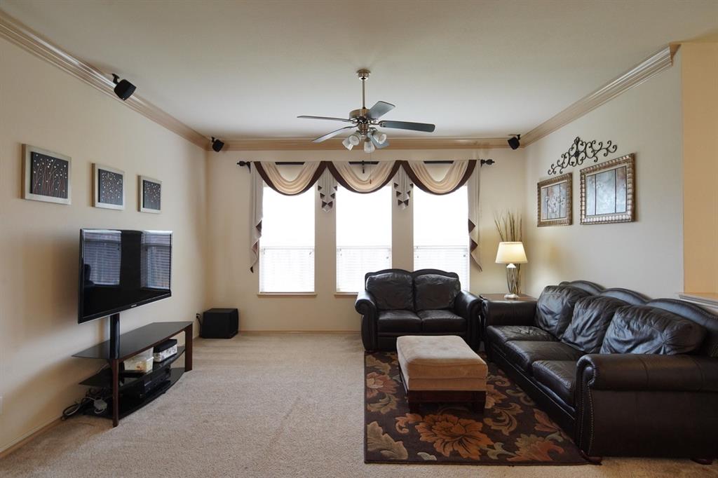 4508 Fox Rio Trail Arlington, TX 76017 - Photo 2 of 28 a living room with furniture fireplace and window