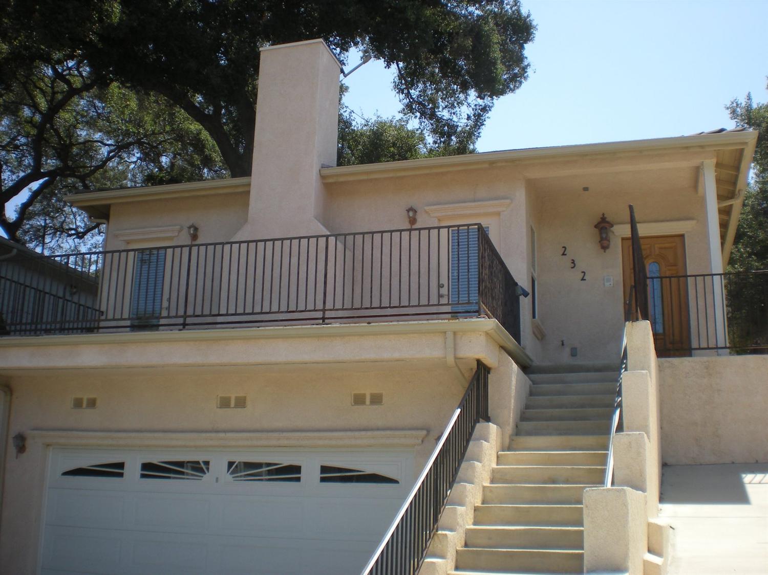 232 Valley Road Oak View, CA 93022 - Photo 3 of 15 a view of balcony with wooden floor and outdoor seating