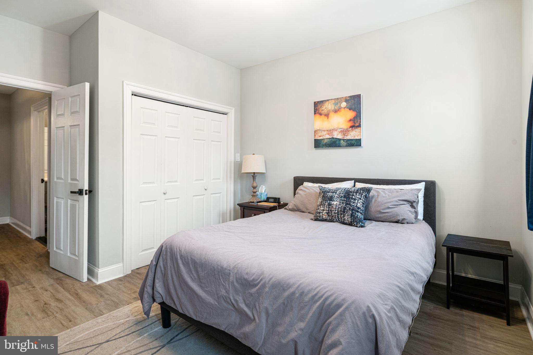 1920 Pierce Street Philadelphia, PA 19145 - Photo 14 of 17 a bedroom with a bed and a painting on the wall