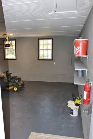 an empty room with wooden floor and closet